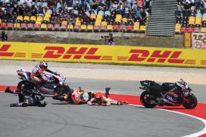 Jorge Martin avoids crashed Miguel Oliveira, Marc Marquez, in 2023 MotoGP Portuguese Grand Prix. - Gold and Goose