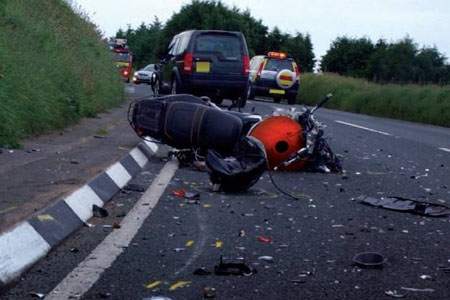 Watch as Reckless Driver Forces Biker to Crash