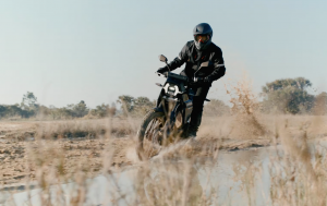 A motorcycle being ridden off-road